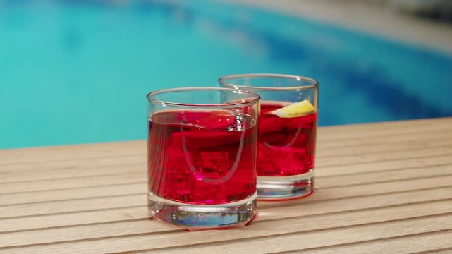 Vermouth Negroni, spanish wine drink, Alcoholic Americano Cocktail bitter, sweet vermouth and soda water, close up of making drink, summer spanish vacations. 