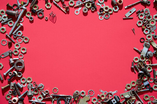 Metal hardware frame on red background