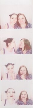 ugc. photo of daughter and mother in a photo booth