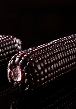 Closeup of black corn on a black background