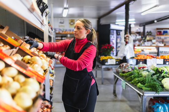 Restocking Shelves in Local Vegetable Shop