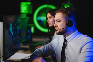 Air traffic controllers managing flight operations with radar