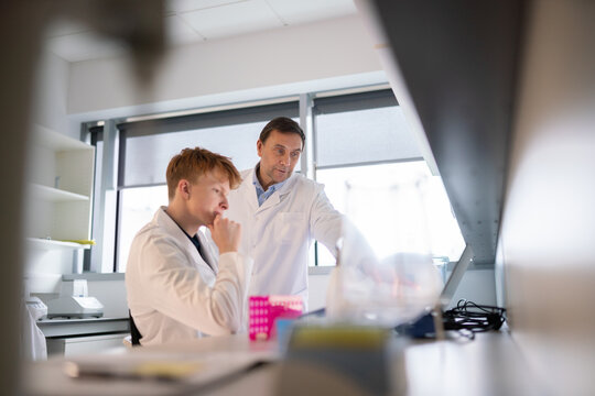 Student Working With Mentor in Lab