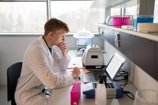 Researcher Using Computer in Laboratory