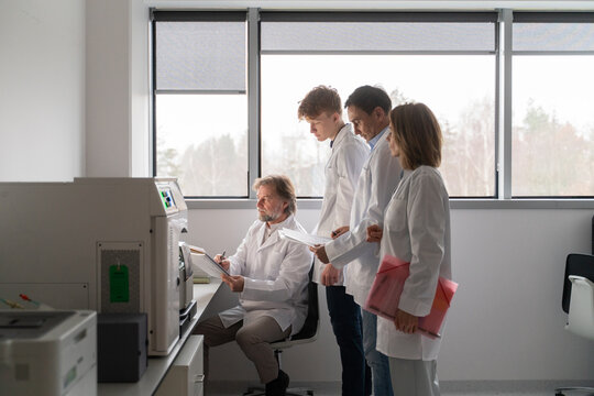 Group of Researchers Working Together in a Laboratory