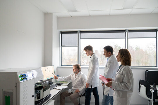 Group of Researchers Working Together at Laboratory
