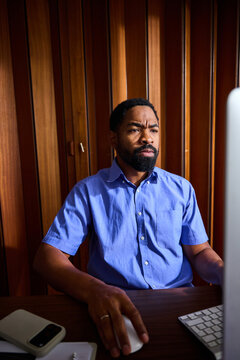 Man looking at the computer screen