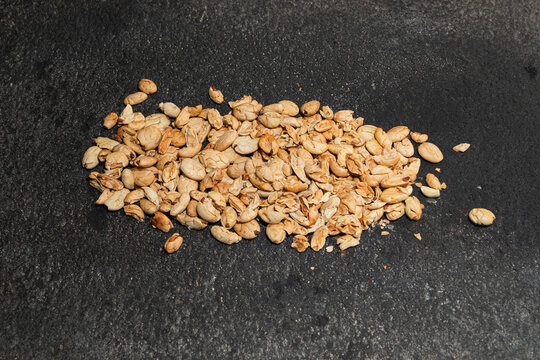 Roasted theobroma bicolor cacao on a metate