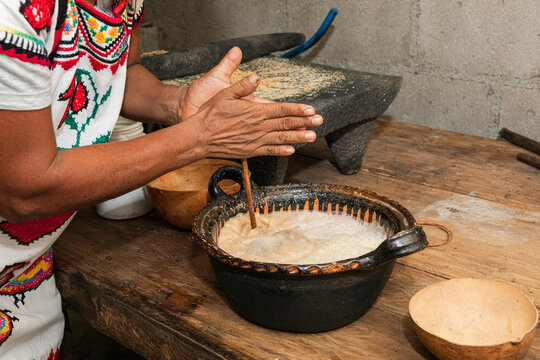 Making traditional beverage in artisan kitchen setting