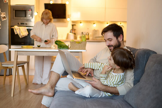 Family Time at Home with Laptop