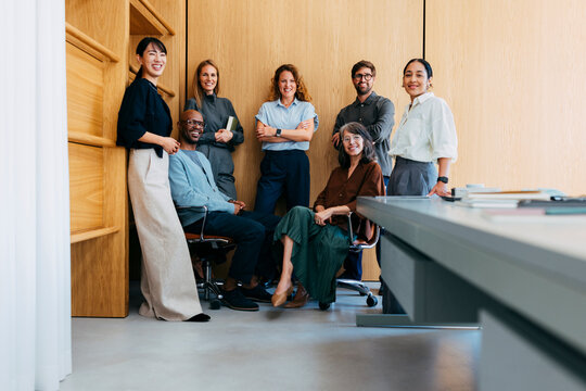 Diverse Team Meeting In Modern Office Space