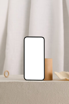 modern composition featuring a smartphone with a blank screen