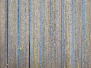 vertical wooden brown unpainted flat boards