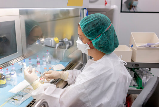 Pharmacist preparing medicine in hospital pharmacy laboratory