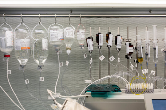 Intravenous bags and syringes preparing for hospital patients