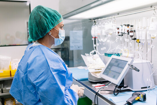 Healthcare worker preparing intravenous oncology medication