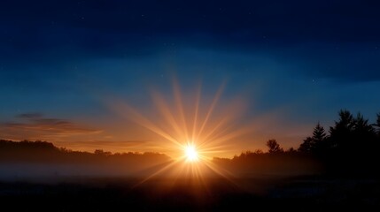 A brilliant sunrise bursts over a misty forest horizon casting radiant golden light and hopeful energy into the deep blue morning sky