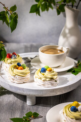 Mini pavlova nests with pistachio cream and easter eggs