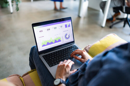 Person Working On Laptop Data Analytics Dashboard