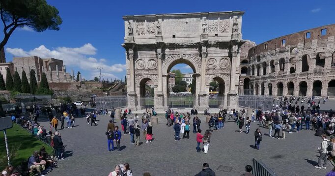 Aerial hyper time lapse at Arch of Constantine and Colosseum in Rome, Italy