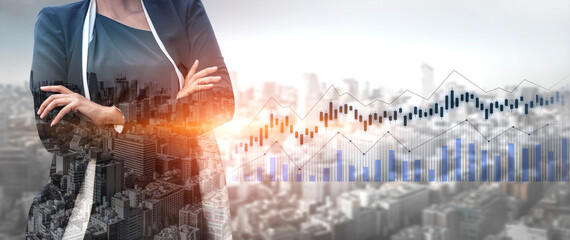 Empowering image of a businesswoman in a suit, standing confidently with crossed arms, overlooking...