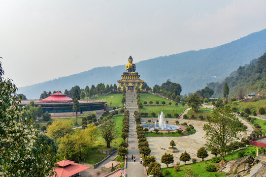Ravangla buddha park, A majestic Buddha statue on hilltop monastery with scenic mountain backdrop in Sikkim.