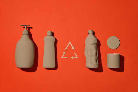 Recycling Concept,assorted recycling containers and a recycling symbol