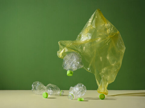 Plastic waste and pollution concept with crumpled bottles
