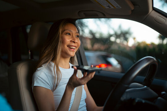 Woman on phone while driving
