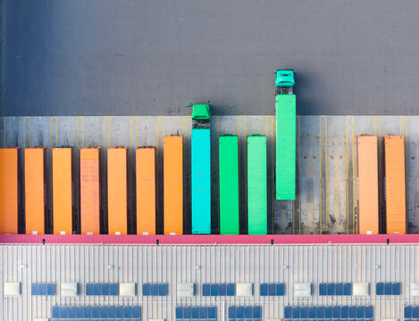 Aerial View of Colorful Shipping Containers at Warehouse Dock