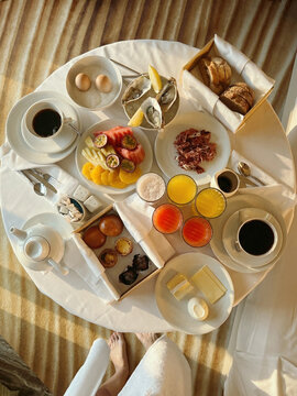 Breakfast Served on a Round Table in a Hotel Room With a View