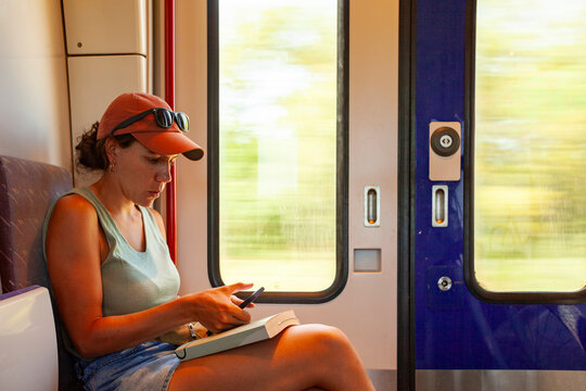 Train Journey with Book and Phone