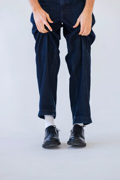Casual Man Standing In Jeans And Shoes