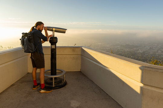 Man binoculars  portrait view focus telescope