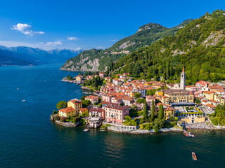 Varenna, Como lake. Picturesque village in Lombardy, Italy. Aerial panoramic drone view of beautiful town with colorful houses surrounded by mountains