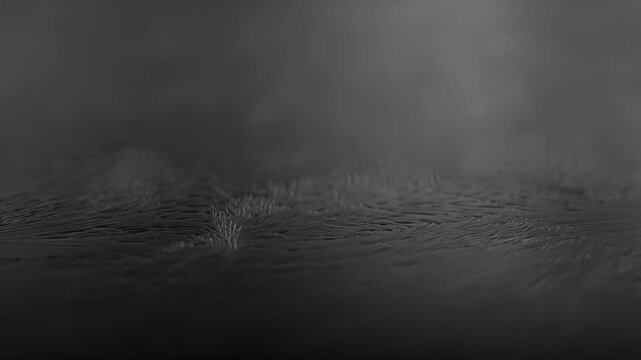 Dim, monochrome water stretches under drifting fog, faint ripples catching scarce light as vapor rolls across the surface, forming a moody, cinematic horizon that hints at cold, silent night.