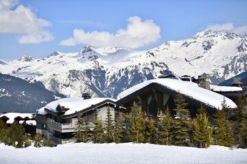 Fototapeta premium Chalets on the slopes of Courchevel ski resort by winter, French alps, France on 3rd March on 2026