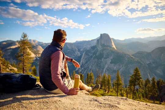 Man takes in the scenery at Yosemite.