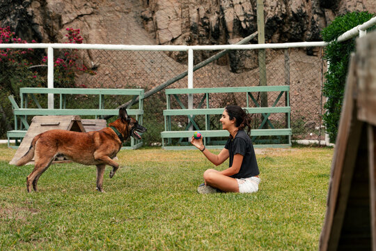 Woman training  her Dog