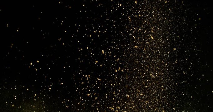 Super Slow Motion of Flying Dirt Soil in the Air. Filmed on High Speed Cinema Camera , 1000fps. Isolated on Black Background.