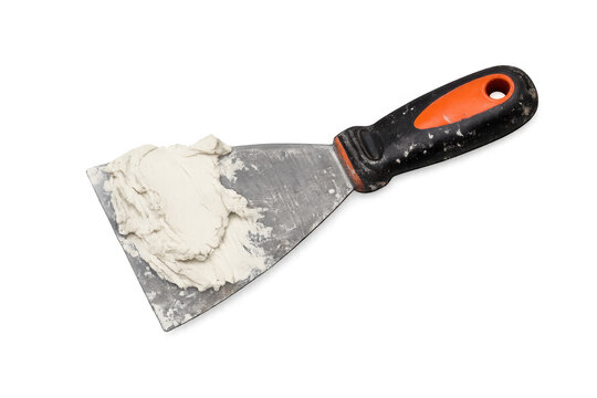 Spatula with plaster compound on transparent background