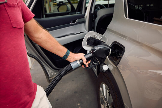 Person filling up the car