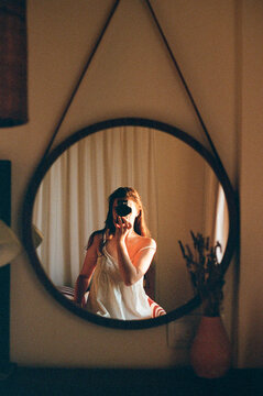 Film Photo Of Woman In Bedroom Mirror Reflection