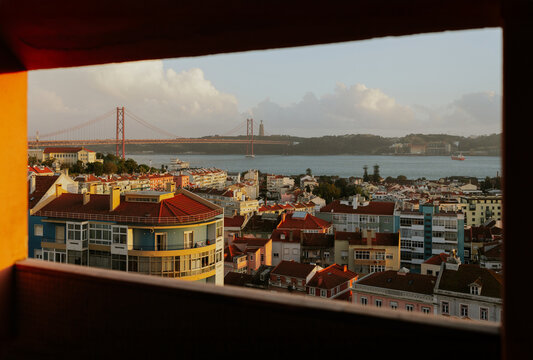 Lisbon cityscape with iconic 25 de Abril Bridge view