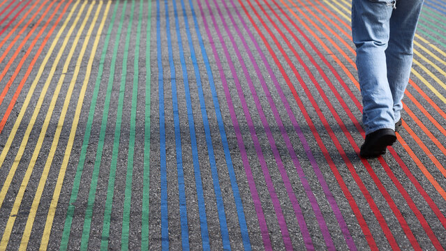 Person Walking on a Rainbow