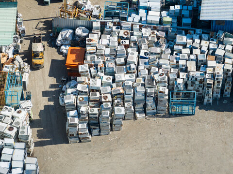 Aerial View of Scrap Yard with Piled Discarded AC Units