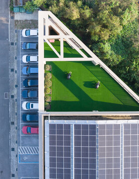Aerial View of Green Rooftop and Solar Panel Array