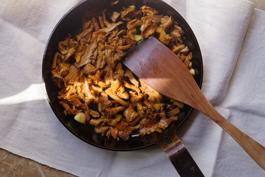 Galletti mushrooms in a Skillet on a White Cloth