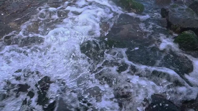 Black Sea, a freshwater discharge enters the marine environment from anti-landslide coastal protection structures along the shoreline at a beach in Odessa, Ukraine