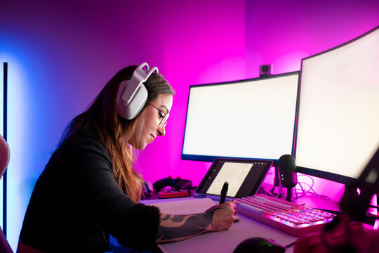 Relaxed content creator working on modern desk